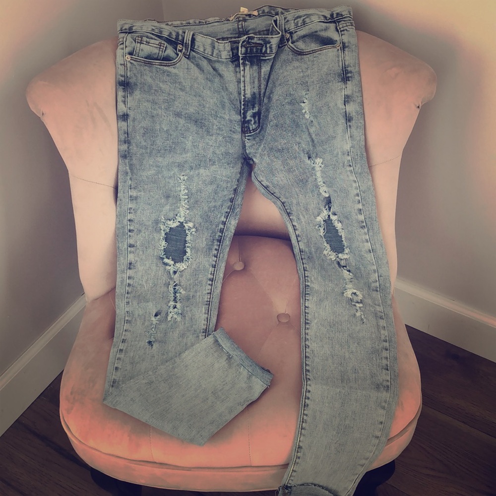 Distressed denim jeans